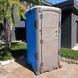 Туалетна кабіна T Blustar RapidLoo STAR (blu stark b04) у використанні біля складського приміщення