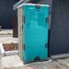 Туалетна кабіна T Blustar RapidLoo STAR (verde tiffany v07) у використанні біля складського приміщення