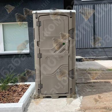 Туалетна кабіна T Blustar RapidLoo STAR (grey e/15) у використанні біля складського приміщення