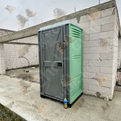 Туалетна Кабіна Armal CUBE Apple Green у використанні під час будівництва