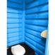 Вигляд всередені туалетної кабіни Укрхімпласт ТКМ Синя: накопичувальний бак для відходів, тримач туалетного паперу, сидіння з кришкою