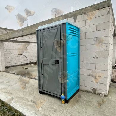 Туалетна Кабіна Armal CUBE Turquoise у використанні під час будівництва