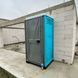 Туалетна Кабіна Armal CUBE Turquoise у використанні під час будівництва