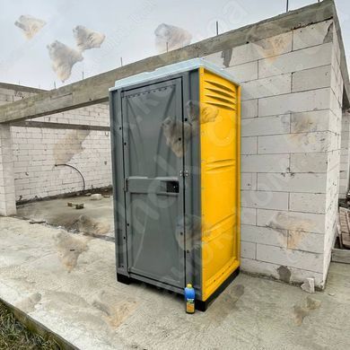 Туалетна Кабіна Armal CUBE Chrome Yellow у використанні під час будівництва